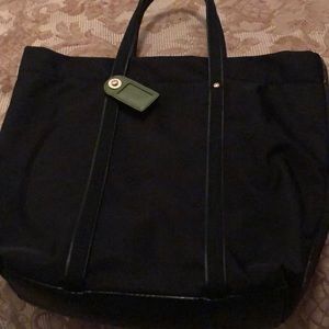 Kate Spade black tote   Leather straps and bottom